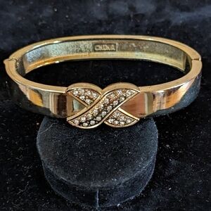 Pre-owned opening bracelet with x design rhinestones, T4B1B